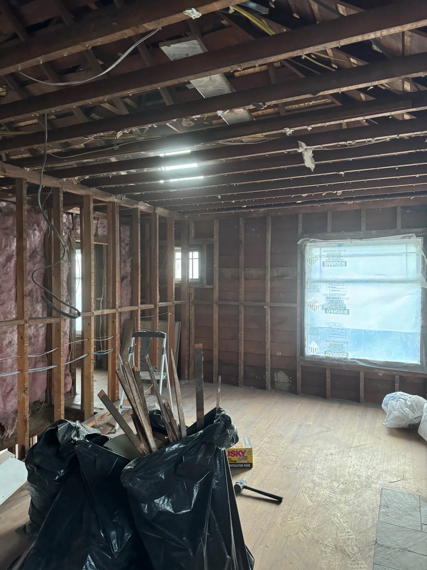 Interior walls and ceiling opened during a whole-home renovation